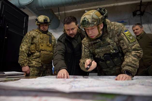 November 30, 2023, Kupyansk, Kharkiv region, Ukraine: Ukrainian President Volodymyr Zelenskyy, center, is briefed on the situation along the Kupyansk Ã¢â‚¬ Lyman defensive line during a visit to a frontline command post in the Kharkiv region, November 30, 2023 in Kupyansk, Kharkiv region, Ukraine. Left to right: Kupyansk tactical group, Oleksandr Lutsenko, President Volodymyr Zelenskyy and Commander of the Ground Forces Oleksandr Syrskyi. Kupyansk Ukraine - ZUMAp138 20231130_zaa_p138_005 Copyright: xPoolx UkrainianxPresidentiax