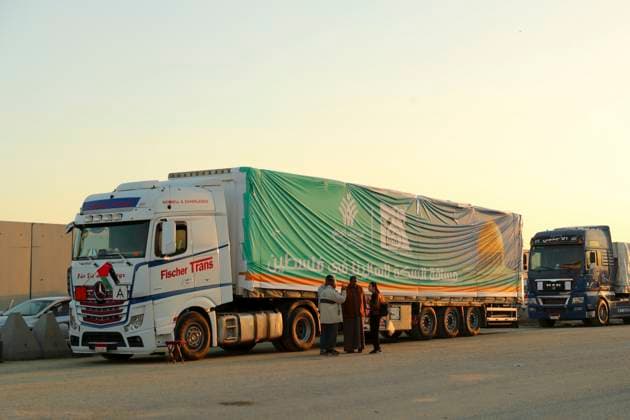 (231201) -- RAFAH, Dec. 1, 2023 -- Trucks loaded with humanitarian aid wait to enter Gaza Strip on the Egyptian side of the Rafah crossing on Nov. 30, 2023. A total of 2,781 trucks loaded with humanitarian aid have so far entered the Gaza Strip through the Rafah crossing, the only linking point between Egypt and the Palestinian enclave, Egypt s State Information Service (SIS) said Thursday. Ayman Walash, the manager of the SIS press center for foreign media, told Xinhua that since the first relief convoy was allowed into Gaza on Oct. 21, a total of 3,176 tons of medical materials, 1,308 tons of fuel, and 13,348 tons of food had been sent to Gaza through the Rafah crossing until Wednesday. Some 10,359 tons of water, 3,203 tons of othe 