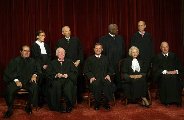 October 23, 2018 - Washington, District of Columbia, U.S. - Washington, D.C. - October 31, 2005 -- The Supreme Court justices pose for their official photograph at the United States Supreme Court in Washington, D.C. on October 31, 2005. Left to right bottom row: Associate Justices Antonin Scalia, John Paul Stevens, Chief Justice John G. Roberts, Jr., Associate Justices Sandra Day O Connor and Anthony M. Kennedy. Top Row: Associate Justices Ruth Bader Ginsburg, David H. Souter, Clarence Thomas, and Stephen G. Breyer. .Credit: - Pool via CNP Washington U.S. - ZUMAs152 20181023_zaa_s152_008 Copyright: xDennisxBrackx