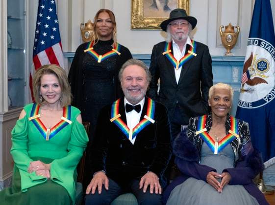 2023 Kennedy Center Honorees pose for a group photo following the Medallion Ceremony of the 46th Annual Kennedy Center Honors at the Department of State in Washington, DC on Saturday, December 2, 2023. From left to right, front: acclaimed soprano Renee Fleming; actor and comedian Billy Crystal; and singer Dionne Warwick. From left to right, back: Rapper, singer, and actress Queen Latifah; and British singer-songwriter producer, and member of the Bee Gees, Barry Gibb. Copyright: xRonxSachsx xPoolxviaxCNPx MediaPunchx