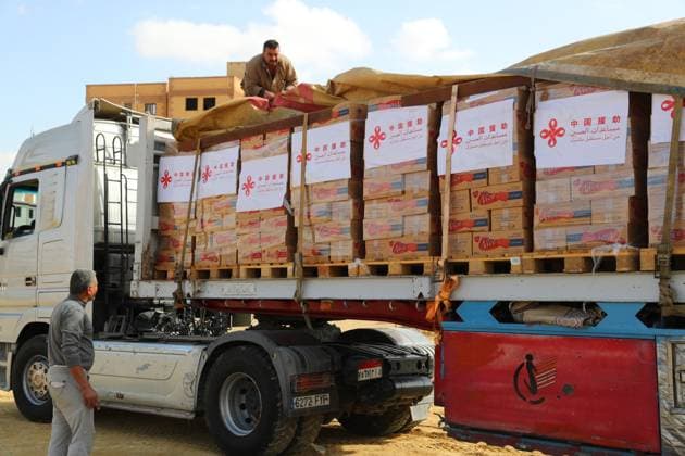 (231205) -- CAIRO, Dec. 5, 2023 -- A truck loaded with humanitarian aid supplies to Gaza provided by the Chinese government waits for departure in Cairo, Egypt, Nov. 27, 2023. The ambassador of Palestine to Egypt has extended his country s sincere gratitude to the Chinese government and people for providing timely humanitarian aid supplies to the conflict-ridden Gaza Strip. ) EGYPT-CAIRO-CHINA-GAZA-HUMANITARIAN AID SUPPLIES-HANDOVER SuixXiankai 