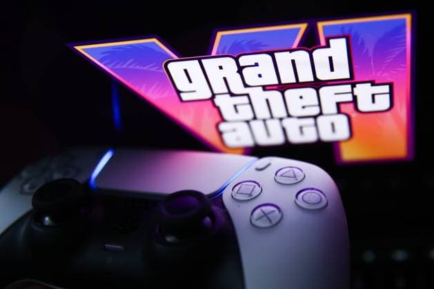 GTA VI Photo Illustrations GTA VI logo from the trailer displayed on a laptop screen and PlayStation DualSense controller are seen in this illustration photo taken in Krakow, Poland on December 5, 2023. Krakow Poland  Copyright: xJakubxPorzyckix originalFilename: porzycki-gtavipho231205_np8Jr.jpg
