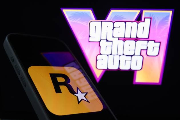 GTA VI Photo Illustrations GTA VI logo from the trailer displayed on a laptop screen and Rockstar Games logo displayed on a phone screen are seen in this illustration photo taken in Krakow, Poland on December 5, 2023. Krakow Poland  Copyright: xJakubxPorzyckix originalFilename: porzycki-gtavipho231205_npGXH.jpg