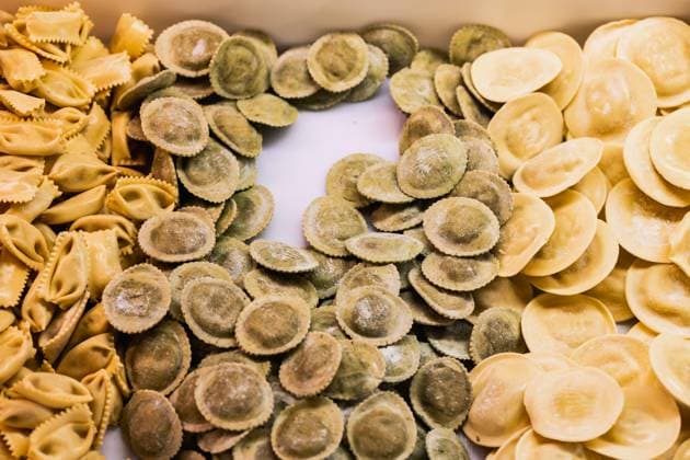 From above closeup of various types of handmade Italian ravioli arranged on white table Model Released HodeiUnzueta_ID16138_491154_002 Copyright: xHodeixUnzuetax