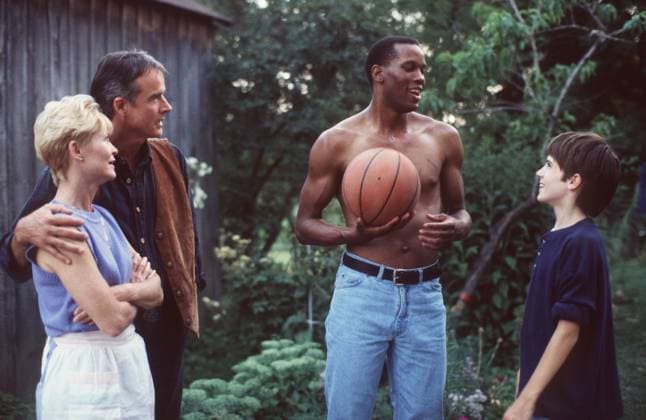 DEE WALLACE STONE, JOHN TERRY, DWAYNE ADWAY, MICHAEL CALOZ in Bad As I Wanna Be: The Dennis Rodman Story. ABC (1 6 97)--BAD AS I WANNA BE: THE DENNIS RODMAN STORY--The private Dennis Rodman behind the very public, flamboyant NBA superstar is revealed in the ABC telefilm, Bad As I Wanna Be: The Dennis Rodman Story, airing Sunday, February 1 (9:00 - 11:00 p.m., ET) on the ABC Television Network. Based on the book by Dennis Rodman with Tim Keown, the film is introduced by Rodman himself, and he appears on camera throughout, commenting on the key events in his life. The movie stars newcomer Dwayne Adway ( Gun, Second Noah ) as Dennis Rodman. Pictured here (l to r): Dee Wallace Stone, John Terry, Dwayne Adway, Michael Caloz, Credit:JOHN M  Copyright: xJOHNxMEDLANDx xAvalonx 0518632405
