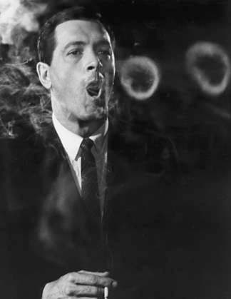 Film Strange Bedfellows Actor Rock Hudson smoking at the set Los Angeles, CA USA  Copyright: xLeoxFuchsx 0583_hudson_smoking_portrait_2-SBF
