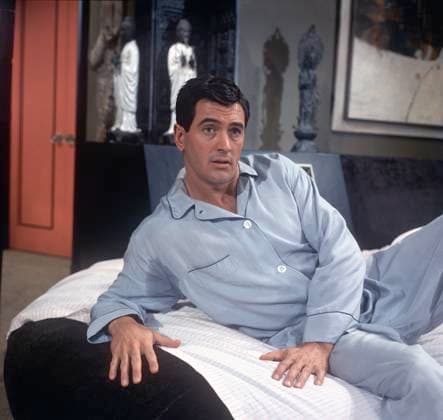 Film Strange Bedfellows Actor Rock Hudson in a scene of the film Los Angeles, CA USA  Copyright: xLeoxFuchsx 1310 Rock Hudson pajama in bed_SBF