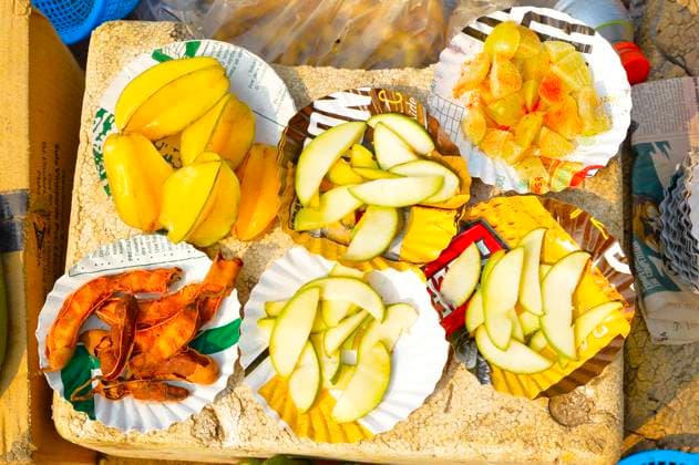 Sliced Konkani fruit like tamarind, amla or Indian gooseberry, raw mango and Star Fruit or Carambola for sale at Nagaon beach, Maharashtra, India, India Sliced Konkani fruit like tamarind, amla or Indian gooseberry, raw mango and Star Fruit or Carambola for sale at Nagaon beach, Maharashtra, India Copyright: xZoonar.com RealityImagesx 20716894