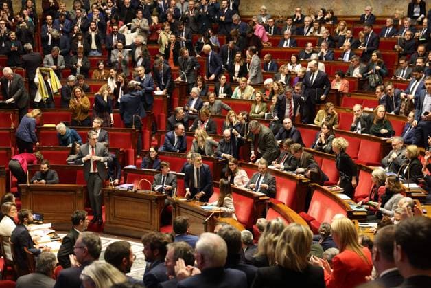 ASSEMBLEE NATIONALE PHOTOPQR LE PARISIEN Le Parisien Arnaud Journois ; PARIS ; 11 12 2023 ; POLITIQUE , ASSEMBLEE NATIONALE , 11 12 2023 , SEANCE PUBLIQUE Examen du Projet de loi pour contrôler l’immigration, améliorer l’intégration GERALD DARMANIN Ministre de l Intérieur et des Outre-mer Reaction au moment de l annonce du vote de la motion de rejet par les députés , les groupes NUPES et RN applaudissent French Interior Minister Gerald Darmanin waiting for a debate on the draft law to control immigration at the National Assembly Examination of the Bill to control immigration, improve integration GERALD DARMANIN Minister of the Interior and Overseas Territories Reaction at the time of the announcement of the vote on the mot  Copyright: xPHOTOPQR LExPARISIEN MAXPPPxLexParisienx xArnaudxJournoisx 20231211LPA1959 20231211LPA1962