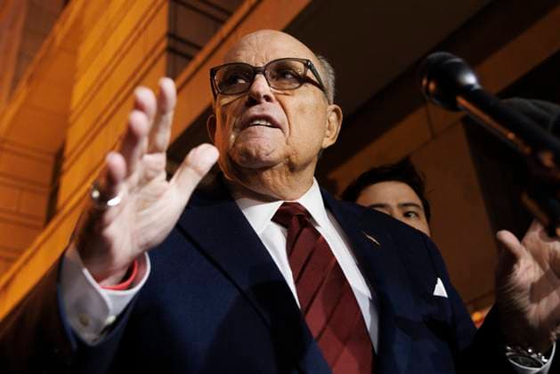 December 11, 2023, District of Columbia, District of Columbia, USA: Rudy Giuliani, former personal lawyer for President Trump, speaks to the press as he leaves the E. Barrett Prettyman U.S. District Courthouse, where a jury will decide punitive damages for two poll workers who successfully sued Giuliani in civil court. District of Columbia USA - ZUMAs293 20231211_znp_s293_001 Copyright: xAaronxSchwartzx