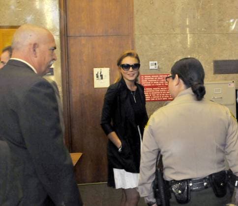 Lindsay Lohan arriving at the Beverly Hills Courthouse before being denied bail and taken into custody 45394, LOS ANGELES, CALIFORNIA - Friday September 24, 2010. Lindsay Lohan arriving at the Beverly Hills Courthouse before being denied bail and taken into custody. The 24 year old actress was handcuffed and taken away after failing a mandatory drug test. Lohan previous finished 13 full days of a 30-day sentence in a Lynwood correctional facility on Aug. 2 after she violated probation in her DUI case. , Credit:Koi Sojer, PacificCoastNews.com Avalon USA, Los Angeles  Copyright: xKoixSojer,xPacificCoastNews.comx xAvalonx 0524542734