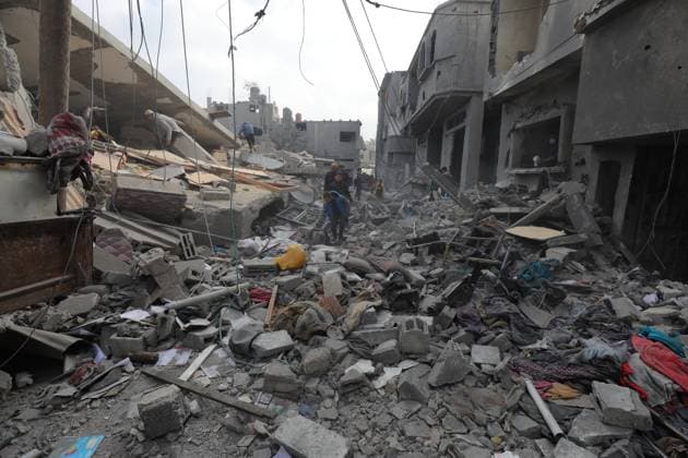 A view of the damaged area after Israeli air strikes on December 12, 2023 in Dair El-Balah, Gaza A view of the damaged area after Israeli air strikes on December 12, 2023 in Dair El-Balah, Gaza. Israeli warplanes launched an airstrike on Dair El-Balah city in the Central Gaza Strip, destroying or severely damaging several buildings. Some Palestinians collected usable belongings from the rubble of their ruined houses. Photo by Omar Ashtawy apaimages Dair El-Balah Gaza Strip Palestinian Territory 121223_Dair_El-Balah_OSH_00(53) Copyright: xapaimagesxOmarxAshtawyx xapaimagesx