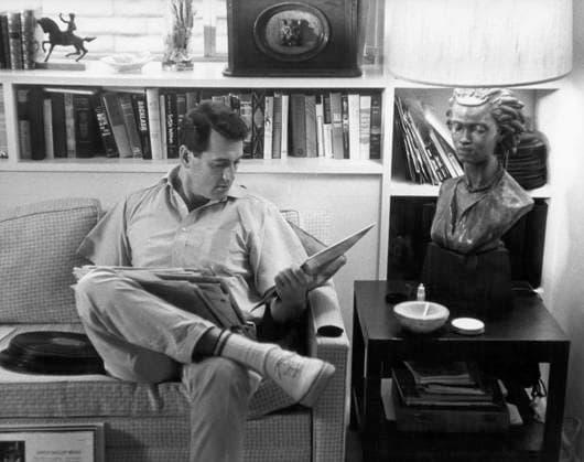 Rock Hudson at Home Actor Rock Hudson with records at his house Los Angeles, CA USA  Copyright: xLeoxFuchsx 1299 Rock Hudson in living room with record collection
