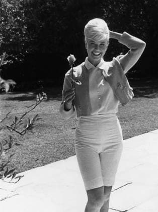 Doris Day At Home Actress Doris Day with a rose at her house Los Angeles, CA USA  Copyright: xLeoxFuchsx R0347-Day-Home-1960