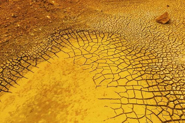 The image showcases the vibrant and textured cracked earth of Rio Tinto, reflecting the area s unique geological characteristics. Model Released DavidJerez_ID17919_540471_048 Copyright: xDavidxJerezx RECORD DATE NOT STATED