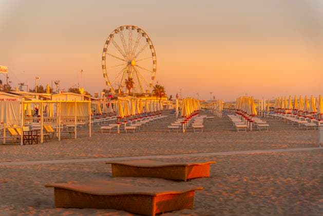 View of ferris wheel and sunshades on the Lido on Rimini Beach at sunrise, Rimini, Emilia-Romagna, Italy, Europe Copyright: FrankxFell 844-31424