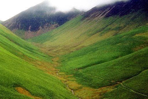 A beautiful shot of green mountains under fog in Wales Uk 55969 RECORD DATE NOT STATED