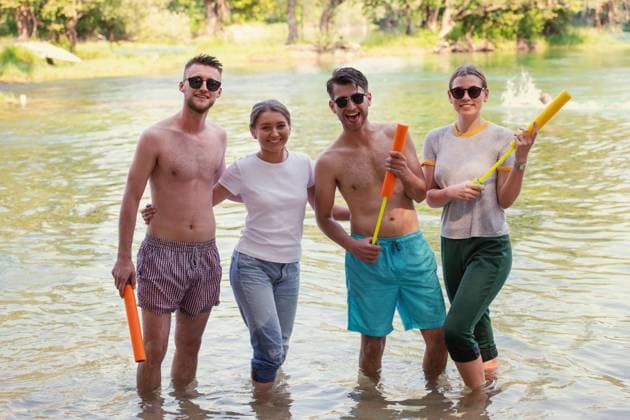 summer joy friends having fun on river summer joy group of happy friends having fun while running and splashing on river ,model released, Symbolfoto Copyright: xZoonar.com benisxarapovicx 14149744 ,model released, Symbolfoto ,property released