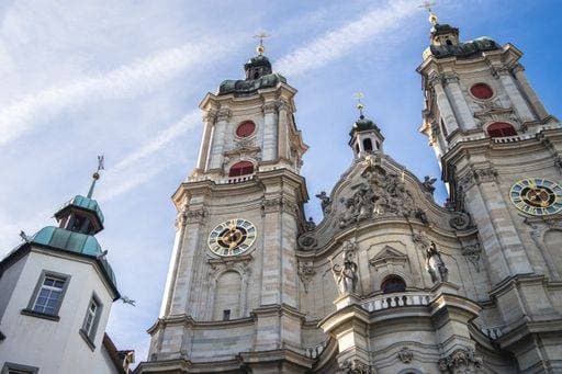 A low angle shot of the facade of Abbey of St. Gall in Switzerland against blue sky 245170 RECORD DATE NOT STATED