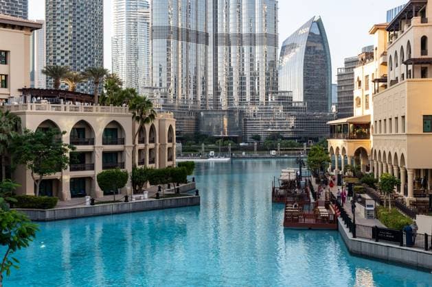 December 7, 2023, Dubai, United Arab Emirates: Buildings of Dubai old town, Souk al Bahar and modern architecture of the centre of the city, including Burj Khalifa is seen against the water of The Dubai Fountain on a hot December day. COP28, running from November 30 to December 12 focuses on how particular nations managed realization of its climate goals. The Conference in Dubai focuses also on the most vulnerable communities and Loss and Damage Fund. Dubai United Arab Emirates - ZUMAs197 20231207_aaa_s197_213 Copyright: xDominikaxZarzyckax