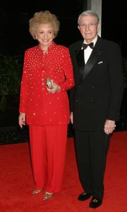**FILE PHOTO** Selma Archerd Has Passed Away. Army Archerd and wife Selma Archerd attend the Kennedy Center Honors Trustees Dinner at the Department of State in Washington, DC on December 4, 2004. Photo Copyright: xHenryxMcGeex