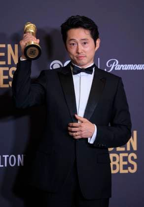January 7, 2024, Beverly Hills, California, USA: Steven Yeun in the press room of the 81st Annual Golden Globe Awards on Sunday January 7, 2024 at the The Beverly Hilton Hotel in Beverly Hills, California. ARIANA RUIZ PI Beverly Hills USA - ZUMAp124 20240107_zaa_p124_131 Copyright: xArianaxRuizx