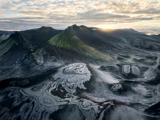Rough rocky mountains with dark surface Selfoss, Iceland CR_OSBJ240105-1295213-01