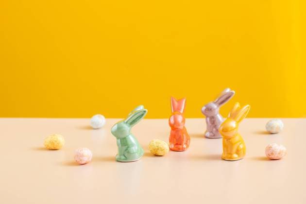 Easter concept backdrop. colorful eggs and rabbits on Yellow. London, England, United Kingdom CR_UUAB240105A4-1299138-01