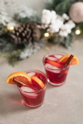 Holiday inspired cocktails topped with oranges & cinnamon sticks Chicago, Illinois, United States R_AKAO2401050A-1316055-01