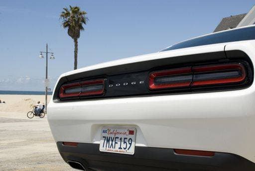 Rear end of a modern white and black Dodge muscle car in Los Angeles, California - USA 1966892