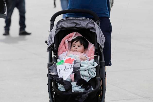January 14, 2024, Mexico City, Mexico City, Mexico: Baby posing in her stroller with a kite in the Zocalo of Mexico City as part of the activities carried out worldwide in support of Palestine, due to the recent attacks they have received from the state of Israel. Mexico City Mexico - ZUMAs310 20240114_zip_s310_006 Copyright: xLuisxExSalgadox