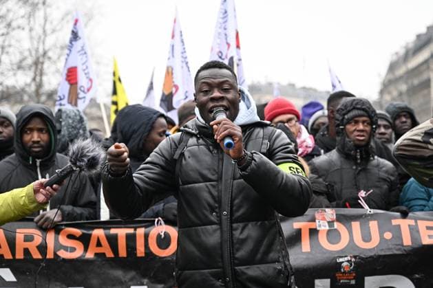 Bilder des Jahres 2024, News 01 Januar News Themen der Woche KW02 Anti-immigration Law Protest - Paris Speech of a demonstrator during a demonstration against the immigration law on January 14, 2024, called by over 400 collectives, associations, unions and political parties to demand the total withdrawal of the immigration law championed by Interior Minister Gerald Darmanin. The mobilization is intended to build pressure ahead of the Constitutional Council s decision, scheduled for January 25. Photo by Tomas Stevens ABACAPRESS.COM  Copyright: xStevensxTomas ABACAx