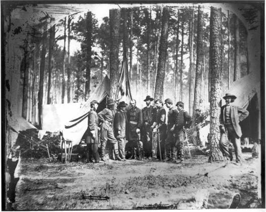 Mathew Brady in the Field Mathew Brady, at far right, may be taking this picture with a mechanism extending from his right hand to a rotating cup in front of the lens. In the center of the group is Brigadier General Robert Potter with his staff before the Battle of the Wilderness in May 1864. Wilderness VA United States EDITORIAL USE ONLY Copyright: xx MES15375 MathewxBradyx picturehistory000759