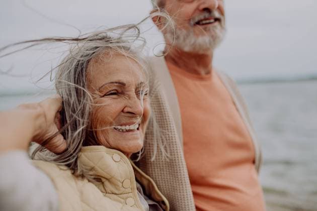 Happy senior couple relaxing and having romantic moment near the autumn sea. Happy senior couple relaxing and having romantic moment at the autumn sea. model released Copyright: xx HHH SENIORS AUTUMN BEACH 2022 HHH 316