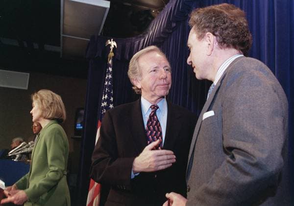 2-5-99 IMPEACHMENT TRIAL--Kay Bailey Hutchison, R-Tx., answers questions with reporters after her press conference as Joseph I. Lieberman, D-Conn., and Arlen Specter, R-Pa., talk about the motion to permit open deliberations in the Senate before votes on the Articles of Impeachment. CONGRESSIONAL QUARTERLY PHOTO BY DOUGLAS GRAHAM EDITORIAL USE ONLY Copyright: xx x cqphotos005649