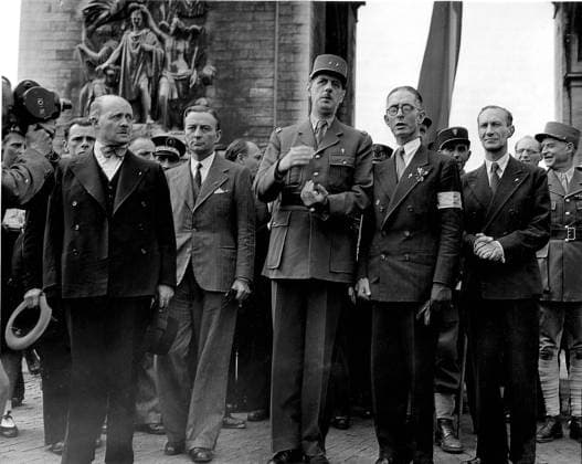 World War II Liberation of Paris, France Paris, France - August 26, 1944 -- General Charles De Gaulle, center, stands in front of the Arc De Triomph, in Paris, France on August 26, 1944, watching a victory parade which is in celebration of the city s liberation from its four years of German rule. Credit: U.S. Army via CNP Paris France EDITORIAL USE ONLY Copyright: xx U.S.xArmyx cnpphotos009125