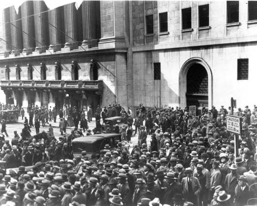The Stock Market Crash Dazed investors gather outside the New York Stock Exchange following Black Thursday, October 24. The stock market crash of 1929 was the worst financial upset in U. S. History. New York City NY United States EDITORIAL USE ONLY Copyright: xx 1930.0107 x picturehistory013422