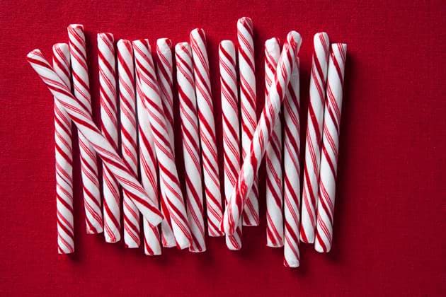 Row of candy canes Los Angeles, California, United States, 29.09.2010, TTBB_BLD084172.jpg, candy, candy cane, christmas, close up, color image, cut out, directly above, festive, food and drink, high angle view, holiday, horizontal, indulgence, large group of objects, nobody, peppermint, photography, red, red background, stick, still life, stripe, studio shot, sweet, temptation, together, tradition, treat, allure, celebration, cheerful, close-up, closeup, color, colour, culture, custom, cut-out, enticement, food, getaway, group, high angle, jolly, luxury, merry, mint, noel, seduction, silhouette, snack, still-life, streak, striate, studio, togetherness, traditional, vacation, vacationing, vegetation, x-mas, xmas, yule, yuletide, Copyright: xJenniferxBoggsx