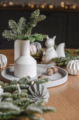 Fir twigs and decoration on table at Christmas, ALKF00917