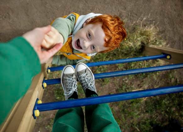 Creative Highlights Symbolbilder Playful boy holding mother s hand on ladder at playground model released, Symbolfoto, MBLF00211