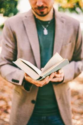 Man wearing blazer and reading book model released, Symbolfoto, SVCF00420