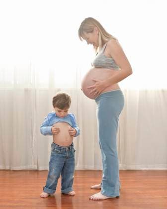 Caucasian boy imitating pregnant mother Manhattan Beach, California, United States, 21.12.2023, model released, TTBB_BLD097282.jpg, 2-3 years, 35-39 years, anticipation, back lit, bare, barefoot, beginnings, bonding, boy, boys, caressing, caucasian, childhood, color image, comparison, connection, copy space, curiosity, curtain, day, discovery, domestic life, expectant mother, family, family with one child, floor, front view, full length, future, growth, happy, holding, hope, imitation, indoors, life events, looking down, love, mid adult, mid adult women, milestone, mother, one parent, people, photography, pregnancy, pregnant, preschooler, pretending, profile, responsibility, side view, smiling, son, standing, stomach, together, two people, Copyright: xSirixBertingx