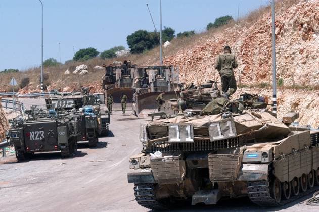 2006 Lebanon War NORTH ISRAEL - JULY 26:Israeli tanks on Israel Lebanon border on July 26 2006. In the conflict 165 Israelis where killed and 500,000 displaced. CHOF ASHQELON ISRAEL EDITORIAL USE ONLY Copyright: xx RafaelxBen-Ari ChameleonsxEyex cewitness025197