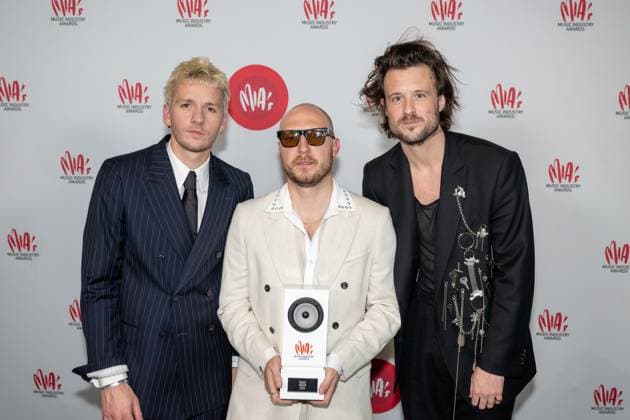 Singer-keyboard player Olivier Symons of Bazart, Singer-guitarist Simon Nuytten of Bazart and Singer Mathieu Terryn of Bazart pose with the MIA award, after the 16th edition of the MIA s (Music Industry Award) award show, in Antwerp, Wednesday 24 January 2024. The Music Industry Awards are the Flemish Music prizes handed out by the VRT and VI.BE.  JONASxROOSENS 84574664
