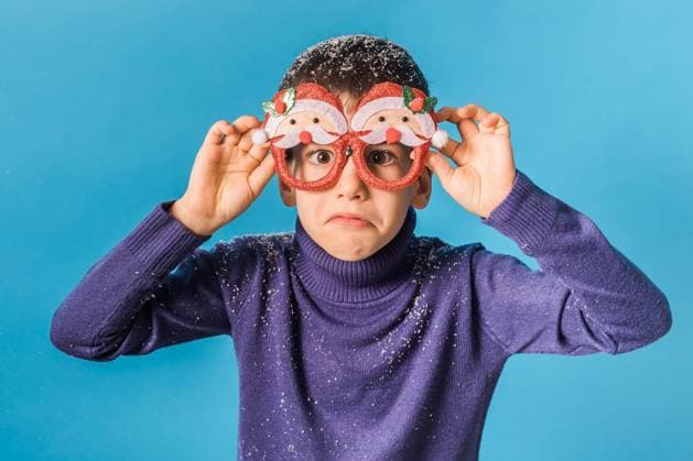 Banner Portrait of sad frustrated boy wearing funny festive santa eyeglasses covering snow eve christmas time isolated over bright blue color background. Generation alpha and gen alpha children. Banner Portrait of sad frustrated boy wearing funny festive santa eyeglasses covering snow eve christmas time isolated over bright blue color background. Generation alpha and gen alpha children ,model released, Symbolfoto Copyright: xZoonar.com TatianaxChekryzhovax 20998084 ,model released, Symbolfoto ,property released