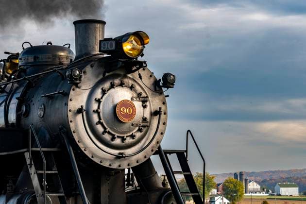 Close Up View of the Front of an Antique Steam Locomotive Blowing Smoke Ronks, Pennsylvania, November 4, 2023 - A Close Up View of the Front of an Antique Steam Locomotive Blowing Smoke Copyright: xZoonar.com GregxKeltonx 21003269