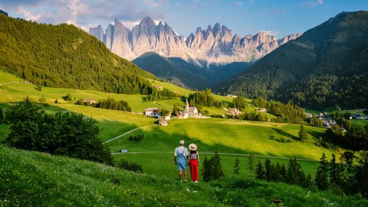 couple viewing the landscape of Santa Maddalena Village in Dolomites Italy, Santa Magdalena village couple viewing the landscape of Santa Maddalena Village Val Di Funes in Dolomites Italy, Santa Magdalena village Dolomites mountains Val di Funes valley, Trentino Alto Adige region South Tyrol Italy ,model released, Symbolfoto Copyright: xZoonar.com FokkexBaarssenx 21105707 ,model released, Symbolfoto ,property released