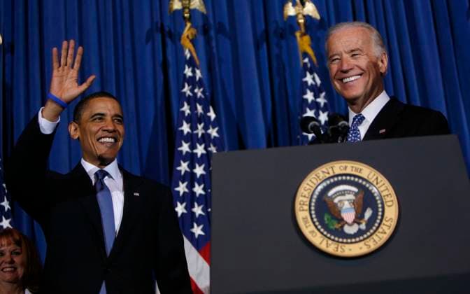 Health Care Victory Rally United States President Barack Obama and U.S. Vice President Joseph Biden smile and wave at a rally celebrating the final passage of the Patient Protection and Affordable Care Act on Tuesday, March 23, 2010. Credit: Dennis Brack Pool via CNP Washington District of Columbia United States of America EDITORIAL USE ONLY Copyright: xx Obama pool 2 DennisxBrackx cnpphotos024610