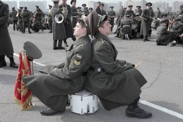 Moscow, Russia. Musicians of the combined orchestra of the Moscow Military District rest at the Khodynka Field during the rehearsal of the parade dedicated to the 53rd anniversary of the Victory of the Soviet people over Nazi Germany in the Great Patriotic War (part of the Second World War). Oleg Buldakov TASS  32122005