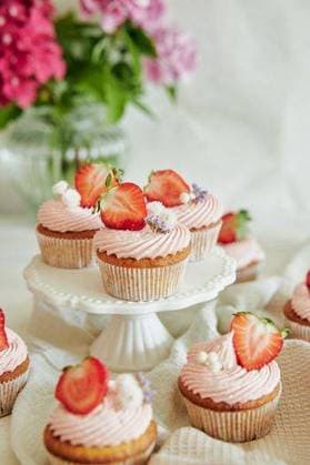 A vertical shot of delicious strawberry cupcakes 2834078 RECORD DATE NOT STATED